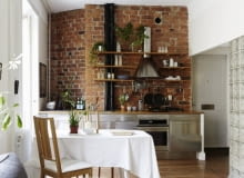 Małe mieszkanie w Sztokholmie - kuchnia. mieszkanie w skandynawskim stylu, luksfery, kawalerka, małe mieszkanie, aranżacja, cegła
