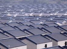 A general view of newly built houses at Dadun village of Lingshui ethnic Li Autonomous County, Hainan province, January 18, 2013. Around 3,500 villagers started to move into 1,029 new houses, each of which measures 253 square meters and took two years to build, according to local reports. Picture taken January 18, 2013. REUTERS/Stringer (CHINA - Tags: SOCIETY BUSINESS CONSTRUCTION) CHINA OUT. NO COMMERCIAL OR EDITORIAL SALES IN CHINA