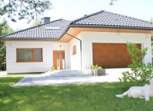 Dom idealnie wpisuje się w aktualne trendy, łącząc modny wygląd zewnętrzny...