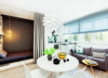 Kilka w jednym: otwarta przestrzeń jest podzielona na aneksy pełniące różne funkcje. Rozkładana kanapa stała przedtem w domu rodzinnym Arletty; po przeprowadzce zyskała nowe obicie, bo poprzednie, w kwiatowy wzór, zupełnie tu nie pasowało. Stolik kawowy jakiś czas temu został kupiony w sklepie westwing.pl i cierpliwie czekał w piwnicy rodziców na swoje miejsce w kawalerce. KILKA W JEDNYM: otwarta przestrzeń jest podzielona na aneksy pełniące różne funkcje. Rozkładana kanapa stała przedtem w domu rodzinnym Arletty; po przeprowadzce zyskała nowe obicie, bo poprzednie, w kwiatowy wzór, zupełnie tu nie pasowało. Stolik kawowy jakiś czas temu został kupiony w sklepie westwing.pl i cierpliwie czekał w piwnicy rodziców na swoje miejsce w kawalerce.