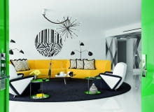 Salon to kompozycja mebli, którą spina w całość okrąg czarnego dywanu (na zamówienie). Fotele są kopiami egzemplarza znalezionego na targu staroci. Lampy za starą odrestaurowaną sofą to reedycje modelu MFL-3 Serge'a Mouille`go z 1952 roku. Stolik ze szklanym blatem - Rodolfo Dordoni dla Minotti.