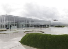 Members of the media work at the site of the Le Louvre Lens Museum, by Japanese architects Kazuyo Sejima and Ryue Nishizawa, on the eve of the inauguration of the museum in Lens, northern France, December 3, 2012. MANDATORY CREDIT Architects Kazuyo Sejima + Ryue Nishizawa SANAA REUTERS/Pascal Rossignol (FRANCE - Tags: SOCIETY MEDIA)