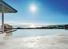 Infinity pool overlooking sea