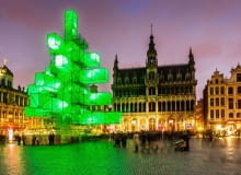 An abstract light installation replaces the traditional Christmas tree at the Grand Place in Brussels, Saturday Dec. 1, 2012. Traditionally, a 20m (65ft) pine tree from the forests of the Ardennes decorates the city's central square, the Grand Place. This year, it has been replaced with a 25m (82ft) construction. (AP Photo/Geert Vanden Wijngaert)