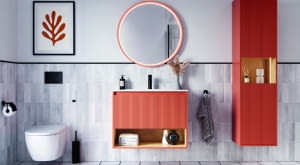 Pomarańczowe meble łazienkowe.