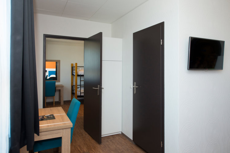 Stapelbedden_in_aparte_kamer_in_Classic_Hotelkamer_Preston_Palace