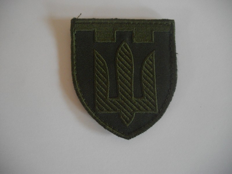 Шеврон (нарукавна емблема)   Сил Територіальної оборони ЗСУ.