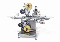 The Herma eco labeller can be seen live for the first time at Fachpack as part of a labelling machine in the redesigned 652C for extremely efficient top and bottom labelling. (Image: Herma)