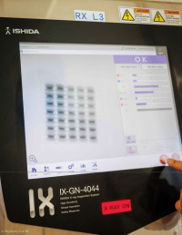 The inspection system detects particles as small as 0.4 mm.