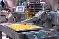 Ausgestattet mit einer Abschneidevorrichtung portioniert der FT722 zum Beispiel Cookies gewichtsgenau auf Backbleche.