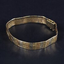 Armband, guld, 18 K, längd 20 cm, vikt 33,5 gram på auktion i Skåne hos Sikö Auktioner