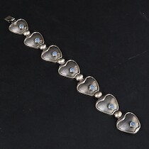 Armband, Alton, Falköping, 1955, silver och månstenar, längd 20 cm, vikt 28 gram på auktion i Skåne hos Sikö Auktioner