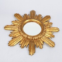 Solspegel, 1900-talets andra hälft, diameter 46 cm på auktion i Skåne hos Sikö Auktioner