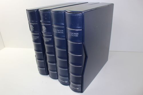 Deutsche Post, 4 blaue Ringbinder mit Kassetten, verschied. Aufdrucke