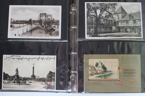 116 alte Ansichtskarten in einem Album