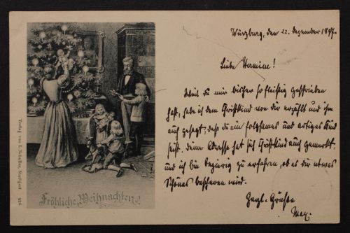 Fröhliche Weihnachten, Familie am Weihnachtsbaum mit Geschenken