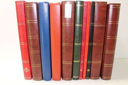 Einsteckalben-Posten, 11 gebrauchte Einsteckalben mit weißen Seiten