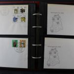 DDR, Ersttagsbriefe, Belege und Ganzsachen in 4 Alben