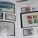 Briefmarken Posten mit Deutsches Reich, BRD und ein altes Schaubek-Vordruckalbum