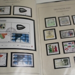 Briefmarken Posten mit Deutsches Reich, BRD und ein altes Schaubek-Vordruckalbum