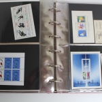 Briefmarken-Album mit Belegen, Blockausgaben, FDC usw.