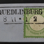 Quedlinburg, 2-zeiliger Rahmenstempel auf DR MiNr. 17, Briefstück