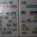 Briefmarken Posten, 12 Alben mit Marken aus vielen Ländern