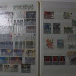Briefmarken Posten, 12 Alben mit Marken aus vielen Ländern