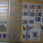 Briefmarken Posten, 12 Alben mit Marken aus vielen Ländern
