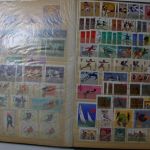Briefmarken Posten, 12 Alben mit Marken aus vielen Ländern