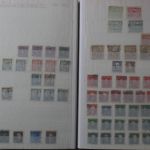 Briefmarken Posten, 12 Alben mit Marken aus vielen Ländern