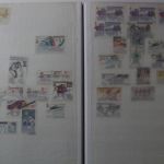 Briefmarken Posten, 12 Alben mit Marken aus vielen Ländern