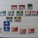 Briefmarken Posten, 12 Alben mit Marken aus vielen Ländern