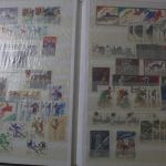 Briefmarken Posten, 12 Alben mit Marken aus vielen Ländern