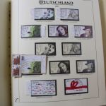 Briefmarken Deutschland Posten in 12 Alben + einige Mappen