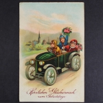 Glückwunsch zum Geburtstag, 3 Kinder mit Blumen im Auto