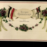Innigen Glückwunsch zum Geburtstag, Blumenbanner mit Fahnen, Prägekarte