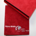 Philswiss, 3 rote Ringbinder mit Kassette, "Münz-Briefe aus aller Welt"