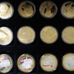 Medaillen-Posten mit 5 Kassetten und 1 Klappalbum