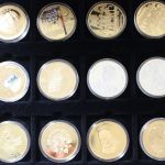 Medaillen-Posten mit 5 Kassetten und 1 Klappalbum