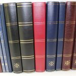 Einsteckalben-Posten, 11 gebrauchte Einsteckalben mit schwarzen Seiten