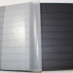 Einsteckalben-Posten, 11 gebrauchte Einsteckalben mit schwarzen Seiten