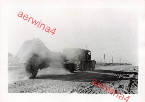 Deutsche Zugmaschine mit Geschütz Rollbahn Wilna Litauen Ostfront