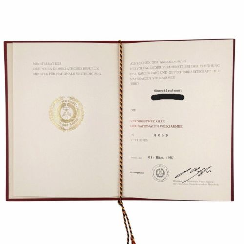 DDR NVA Urkunde Verdienstmedaille Nationale Volksarmee Gold 1987 Oberstleutnant