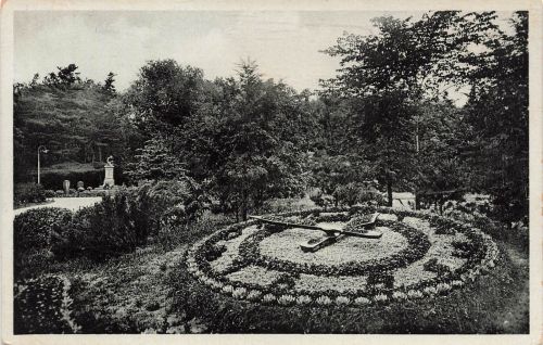 AK Komotau Chomutov Blumenuhr Park Böhmen 1933 gelaufen Postkarte