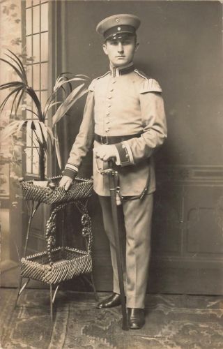 Fotokarte 1.WK Portrait deutscher Soldat Musiker mit Säbel in Posen