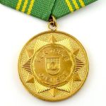 DDR Medaille treue Dienste in den Bewaffneten Organen des MdI in Gold 141c