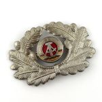 DDR NVA LaSK Mützenabzeichen Offiziere silberfarben Mützenkranz Korkade