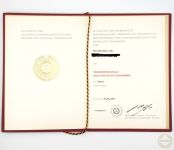 DDR Verdienstmedaille der NVA in Gold Urkunde Oberstleutnant der Reserve 1987
