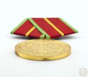 DDR Verdienstmedaille der Grenztruppen der DDR in Gold Bartel 280c